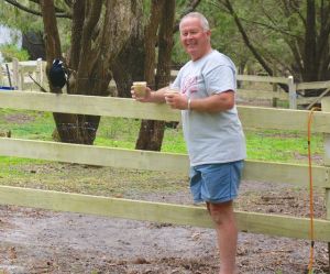 A friendly magpie intend on sharing the captain's coffee at the Eco park