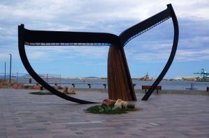 The huge wood and steel whaletail that frames a view of Esperance Harbour from midtown Esperance